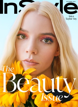 Anya Taylor-Joy poses with sunflowers on the cover of InStyle