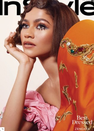 Zendaya wears an orange and pink dress on the cover of InStyle