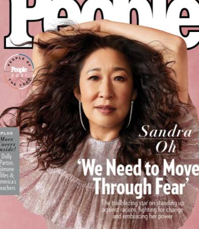 Sandra Oh in a pink top on the cover of People