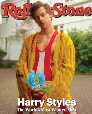harry styles in a yellow sweater on the cover of rolling stone